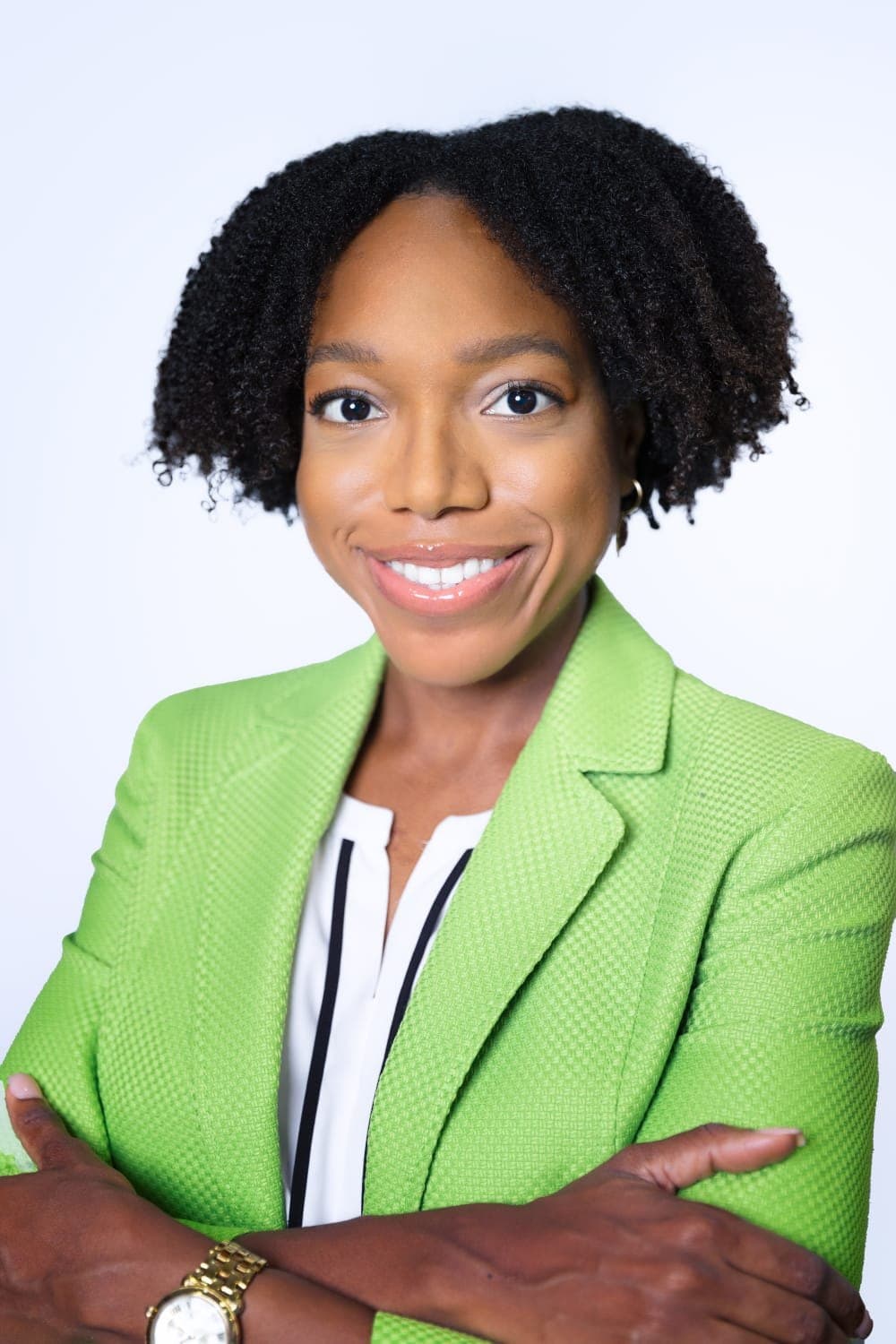 Dr. Gabrielle Alexander, smiling, in a green jacket
